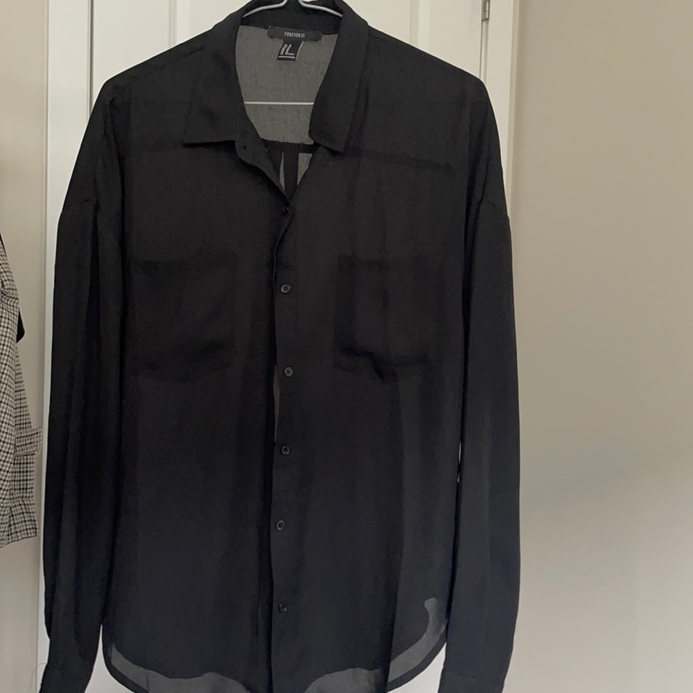 Black semi sheer black blouse. NWOT forever 21